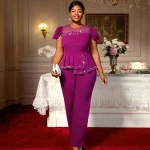 Elegant Beaded Jumpsuit with Peplum & Tulle